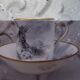 Tasse et sous tasse décor en grisaille Porcelaine de Paris XIXème signée décor moulin