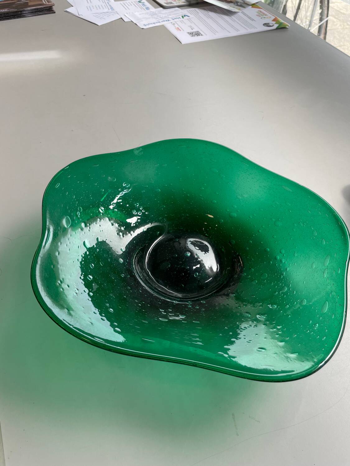 Green glass dish by Max Verboeket