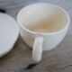 Series of 7 vintage ceramic cups and saucers by Le Pot de Terre