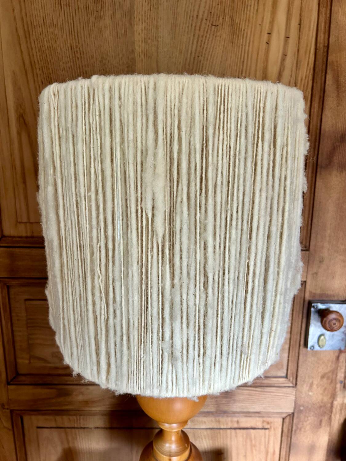 Turned wood base lamp with spun lampshade