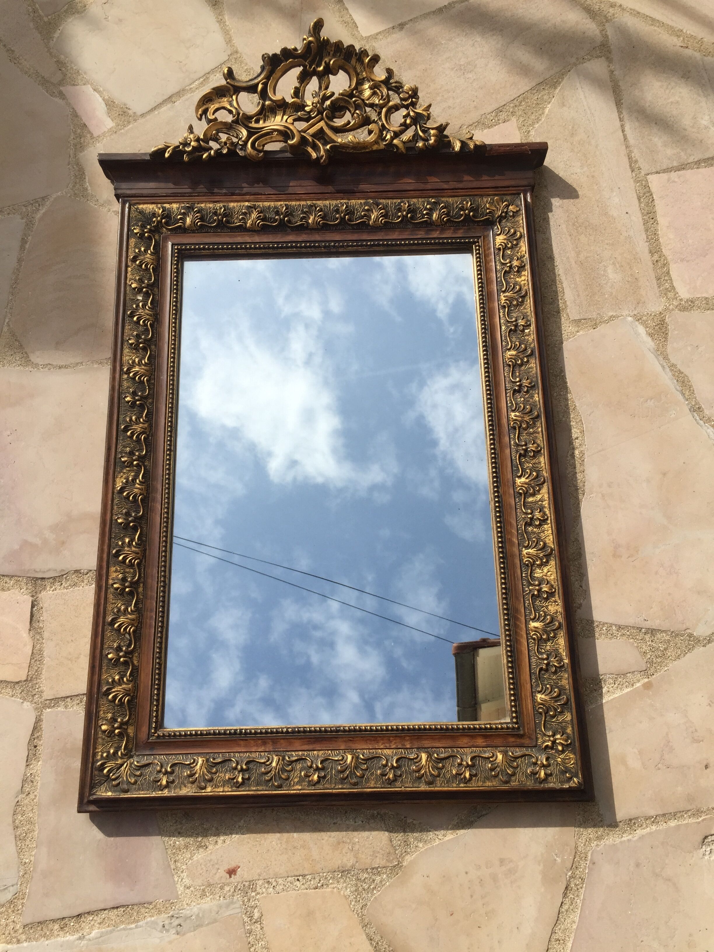 Antique mirror in gilded wood 96 x 58.5 cm