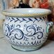 Italy early 20th century: Large cachepot or planter in glazed earthenware.