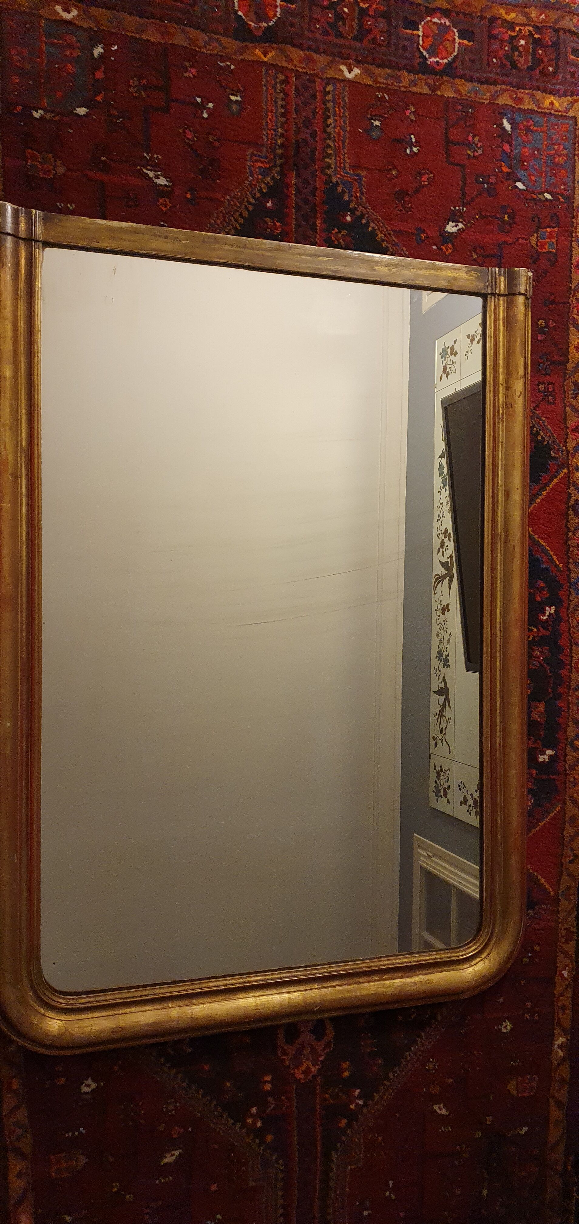 Large Louis Philippe mirror gilded with leaf. 137 x 99 cm.