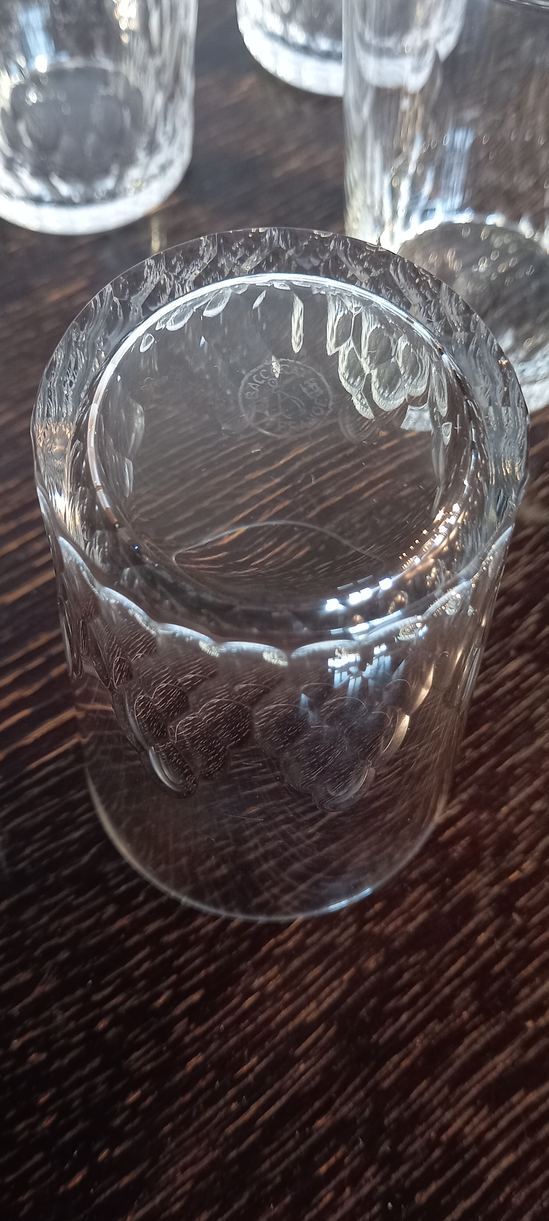 8 Baccarat crystal footless glasses, cut with facets