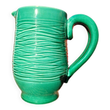 Green glazed ceramic pitcher