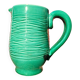 Green glazed ceramic pitcher