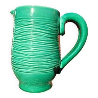 Green glazed ceramic pitcher