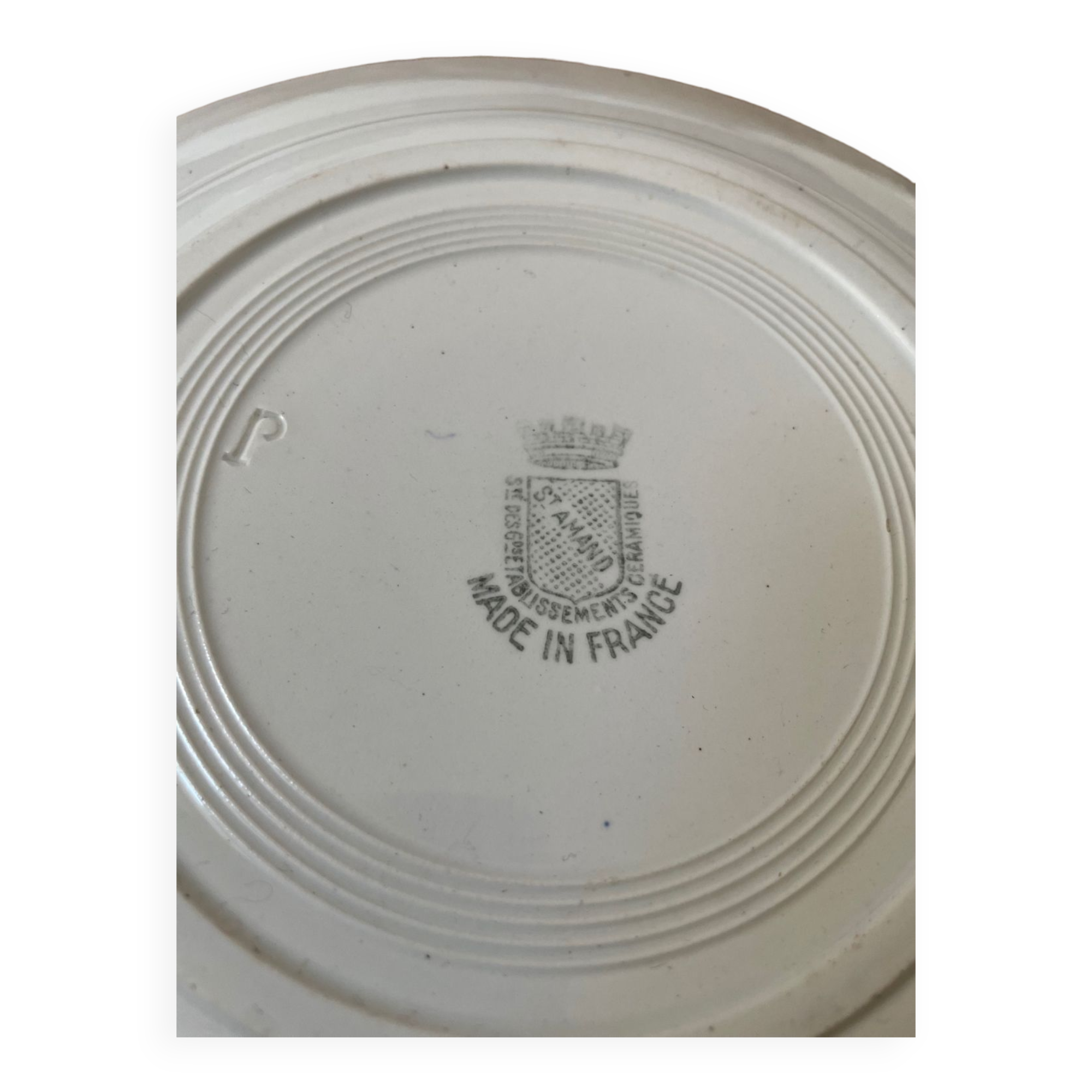 Flat faience plates from saint amand and hamage