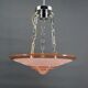 Suspension Art Déco moderniste en verre rose et bronze chromé, par Henry Petitot, 1935