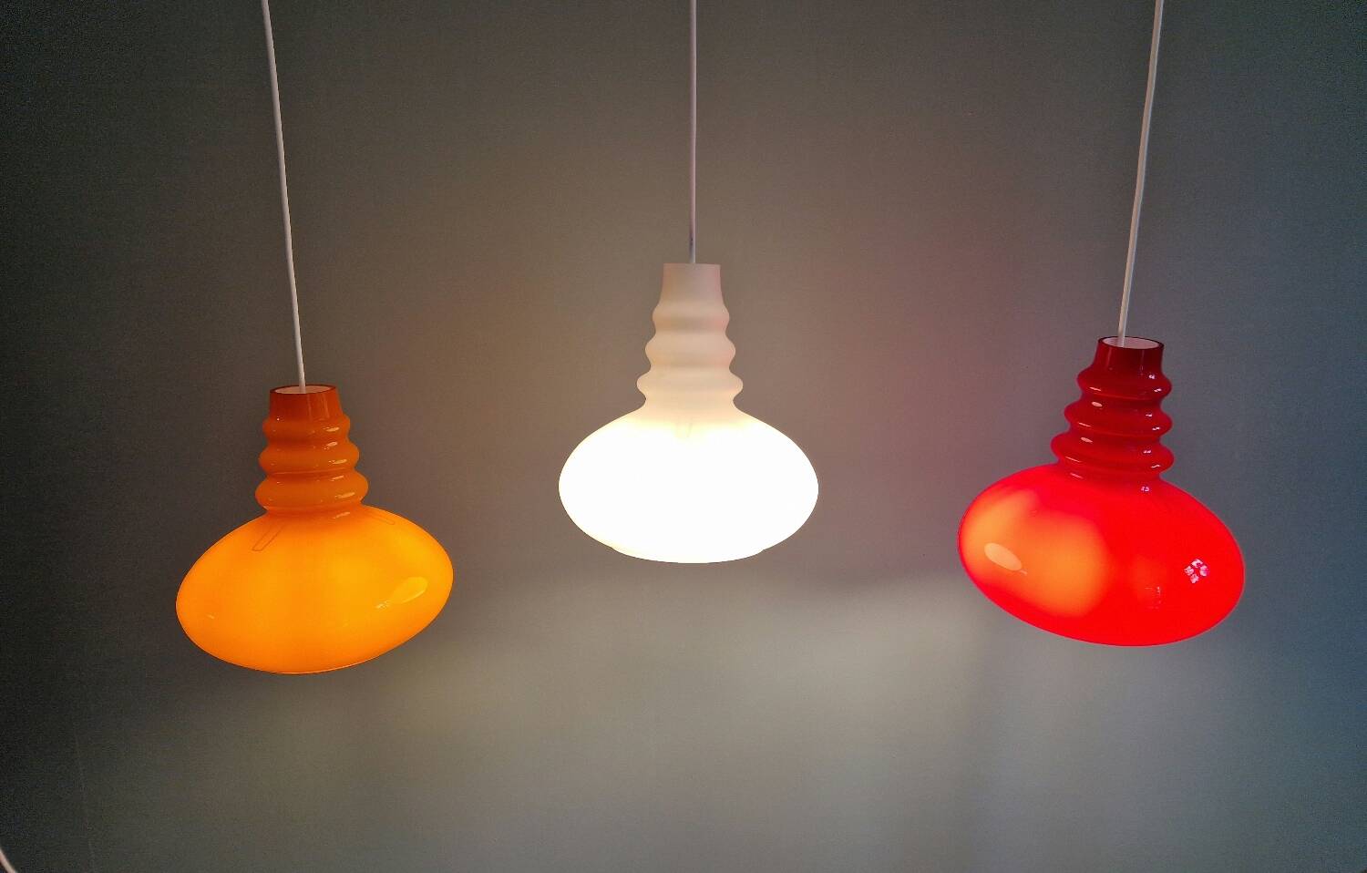 Trio of Space Age opaline pendant lights, Peill & Putzler, 1970