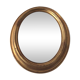 Old oval mirror in gilded wood