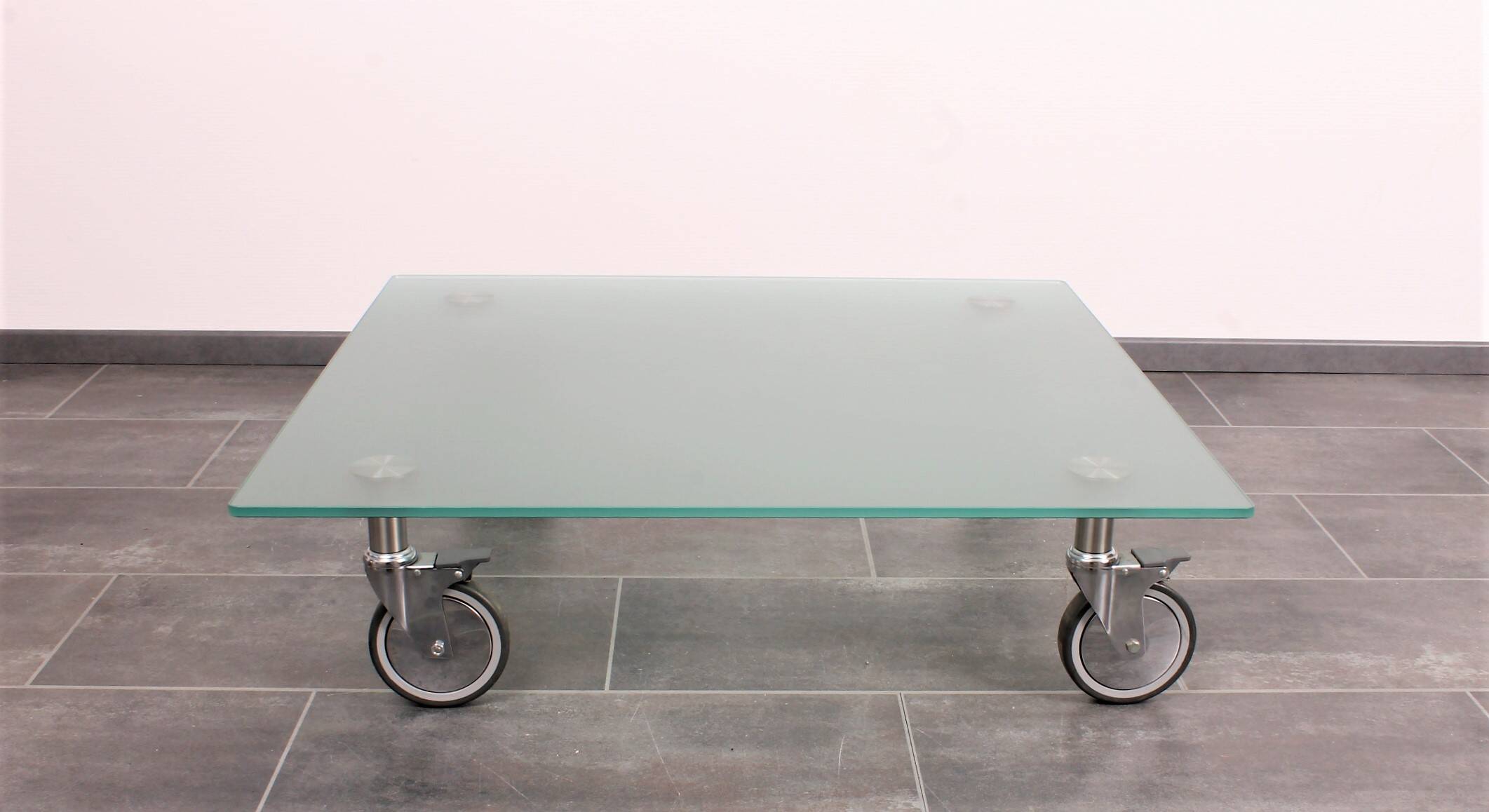 Wheeled glass coffee table