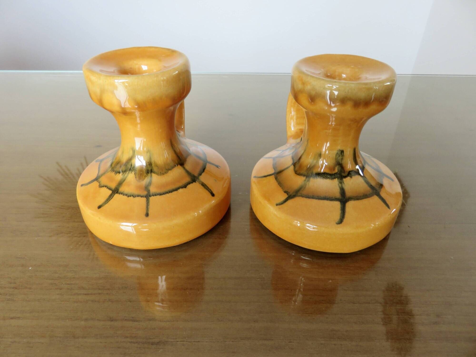 Pair of orange ceramic candlesticks from the 60s