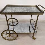 Brass and glass rolling trolley