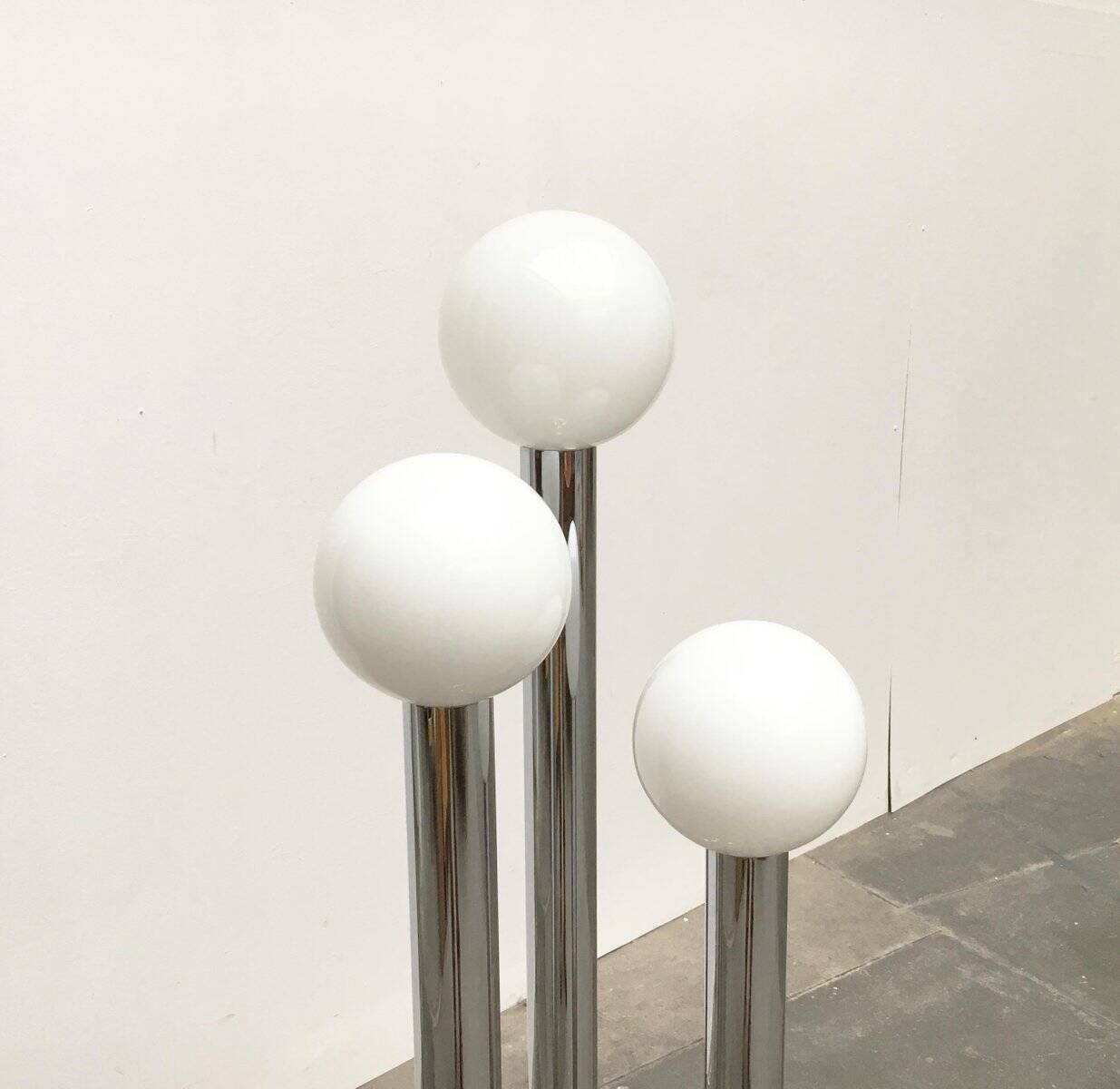 Vintage German floor lamp from the space age of the 1970s in glass and metal.