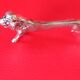 Set of 8 silver metal knife holders. Lion shape.