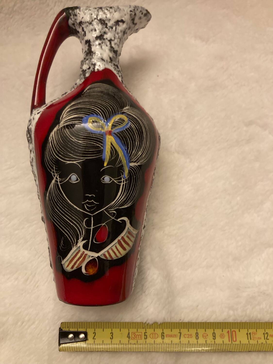 Vintage vase, made of glazed lava stone.