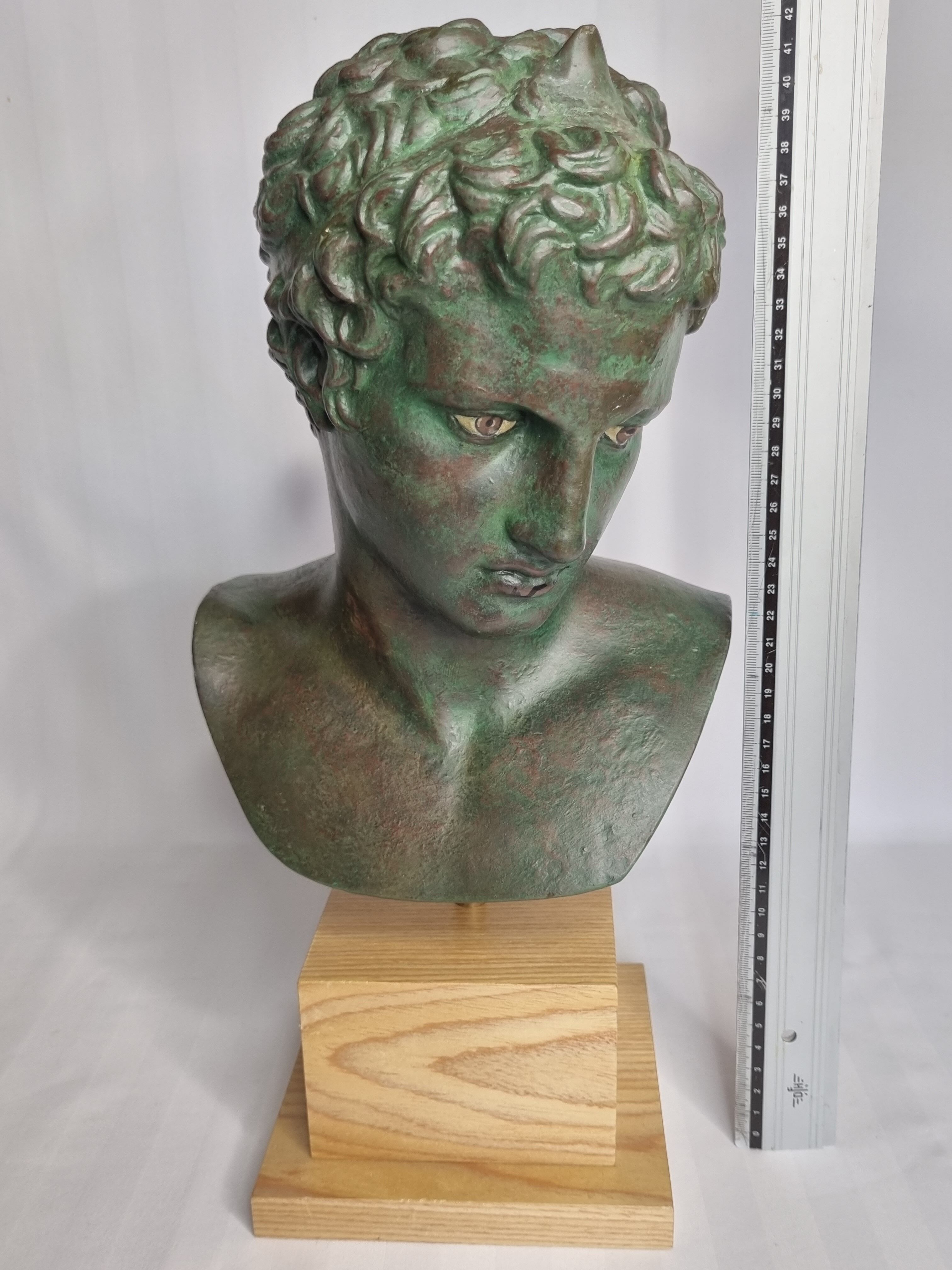 Bust of the Ephebus of Marathon in patinated plaster on base