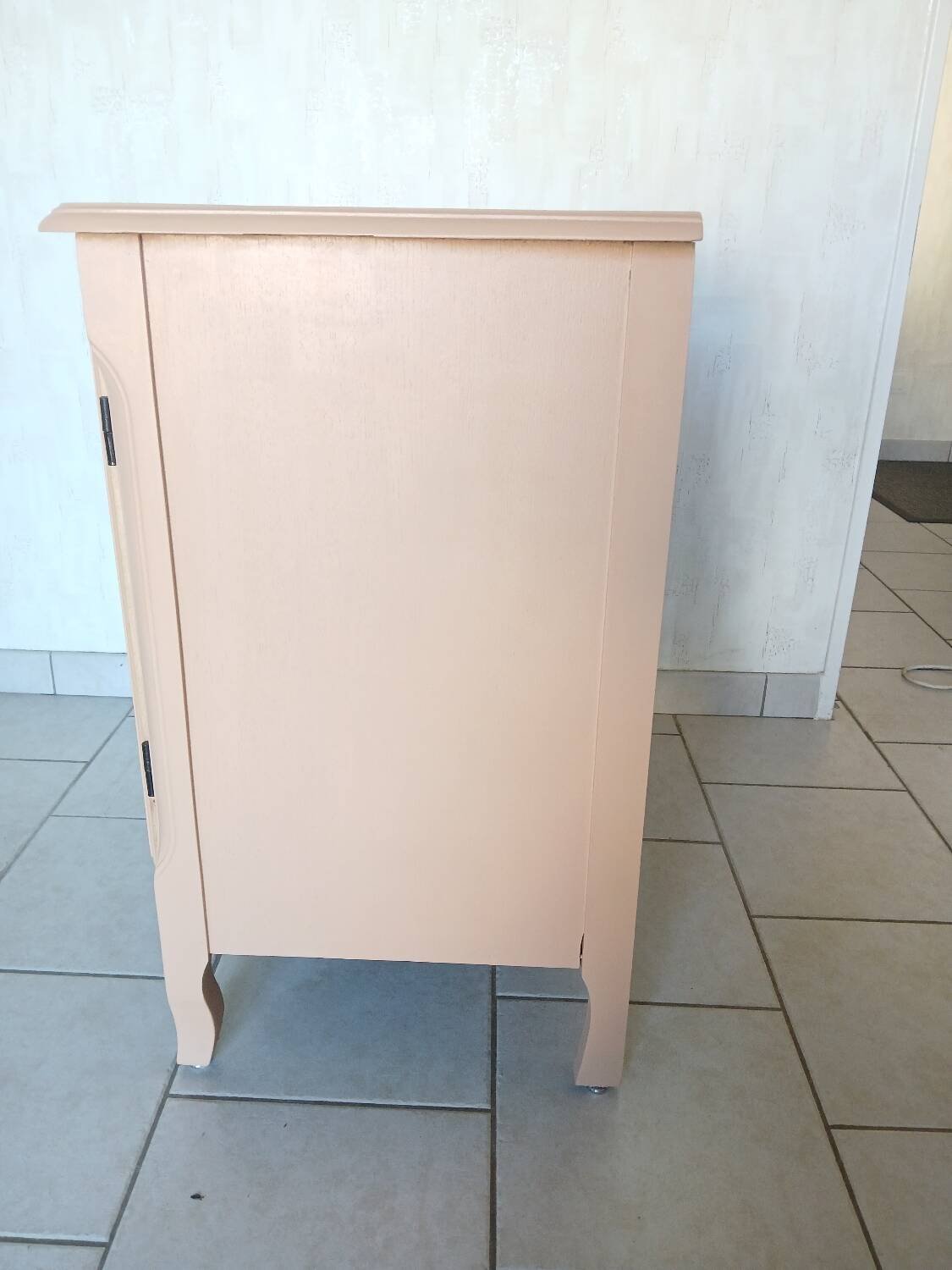 Peach-coloured TV unit