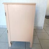 Peach-coloured TV unit