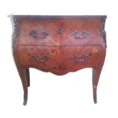 Ches of drawers in Louis XV-style marquetry.