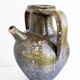 Ancient oil jar in glazed terracotta, khaki green — Auvergne, Lezou