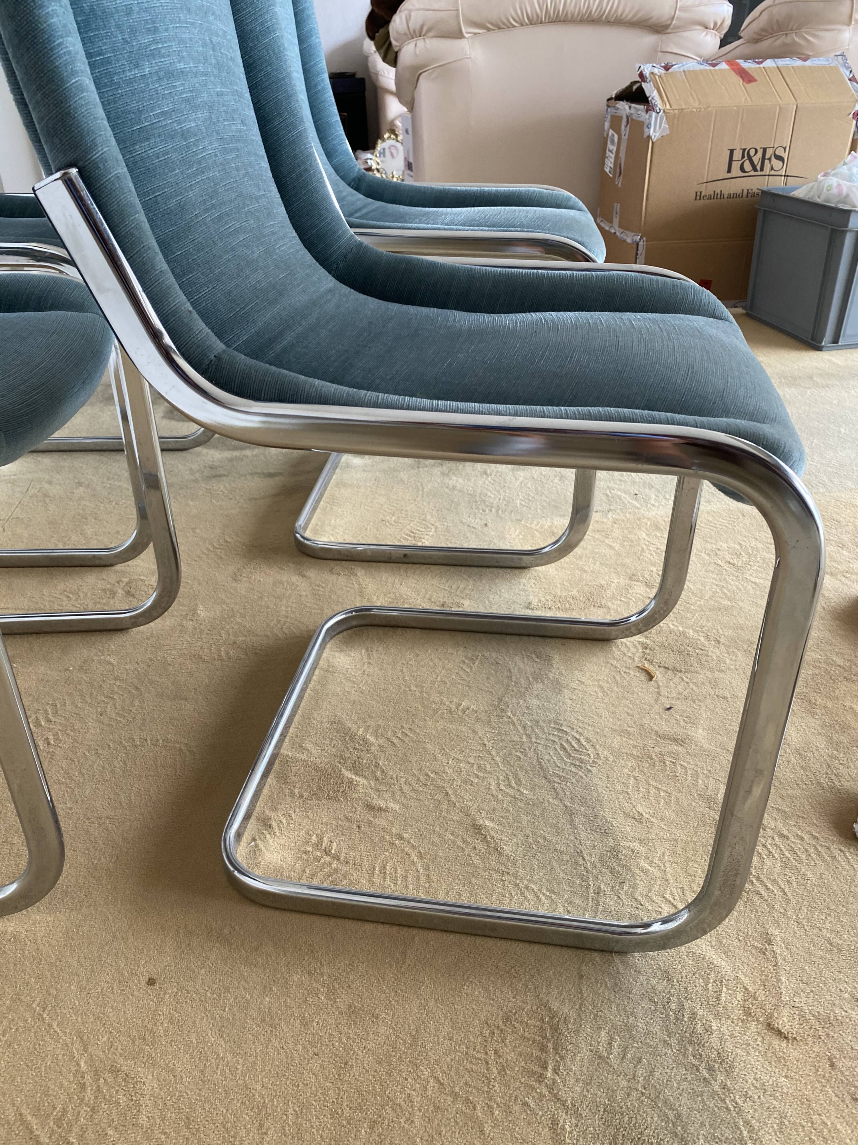 Set 4 steel design chairs and fabrics