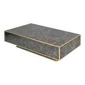 Marble glass coffee table with "solar eruption" decor.
