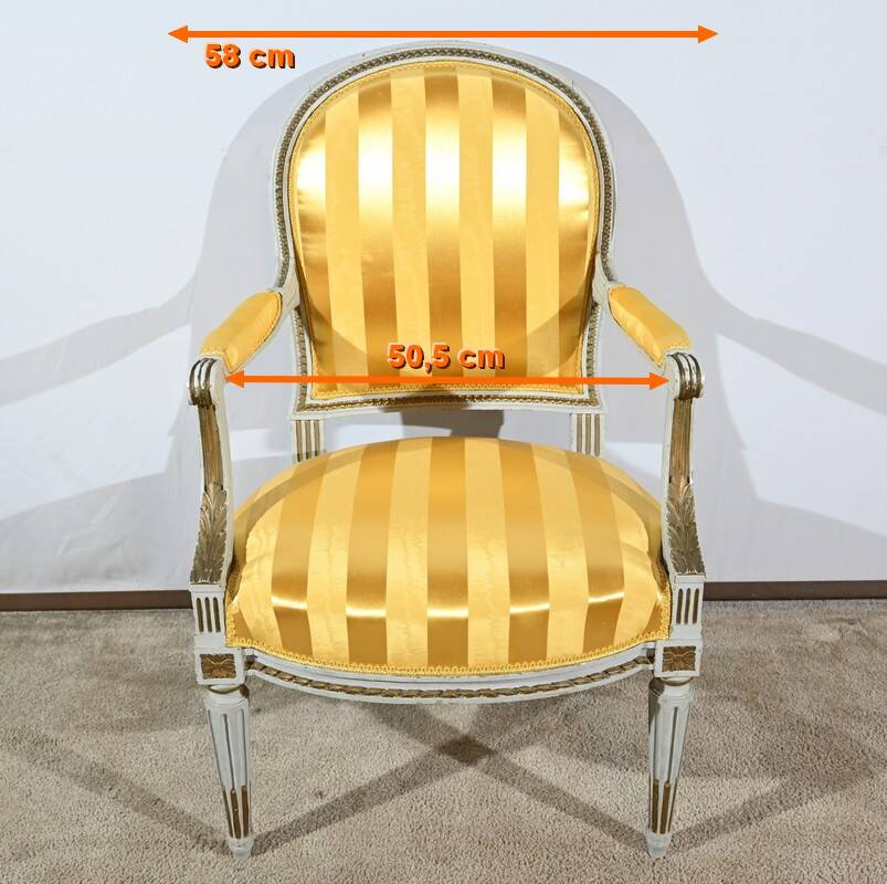 Pair of Cabriolet Armchairs, in rechampi wood, Louis XVI style – Late 19th century