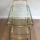 Neo classical style table in silver and gold metal and glass