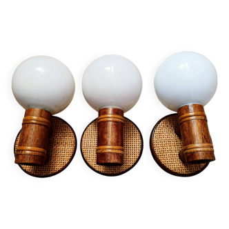 3 rattan and opaline wall lights