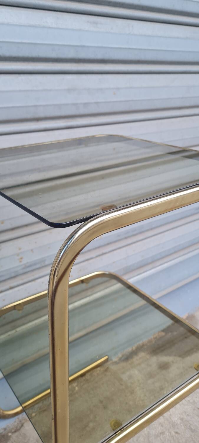 End table in gold metal and smoked glass