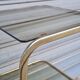 End table in gold metal and smoked glass