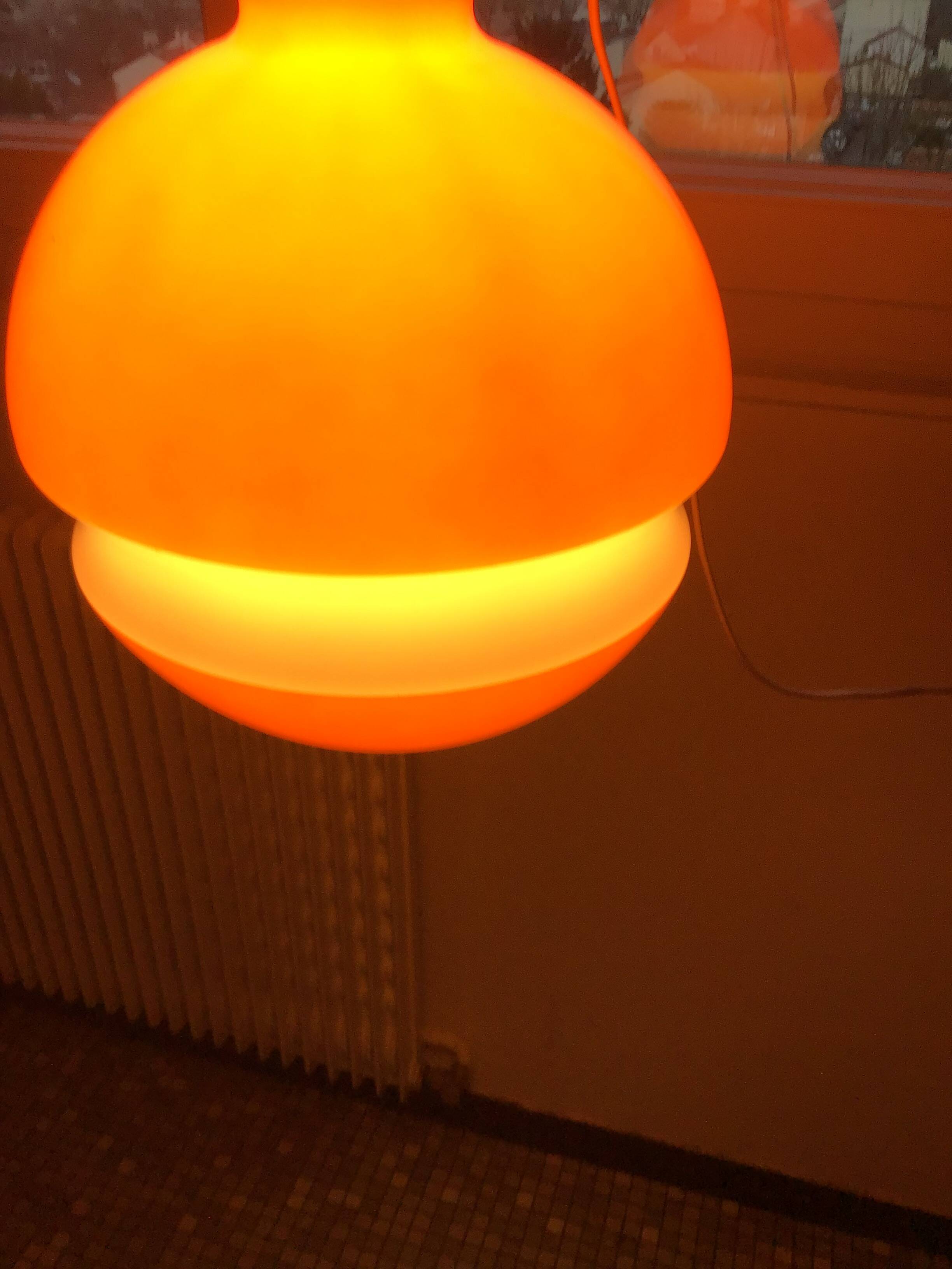 Globe pendant light in orange and white opaline glass, wiring in working order