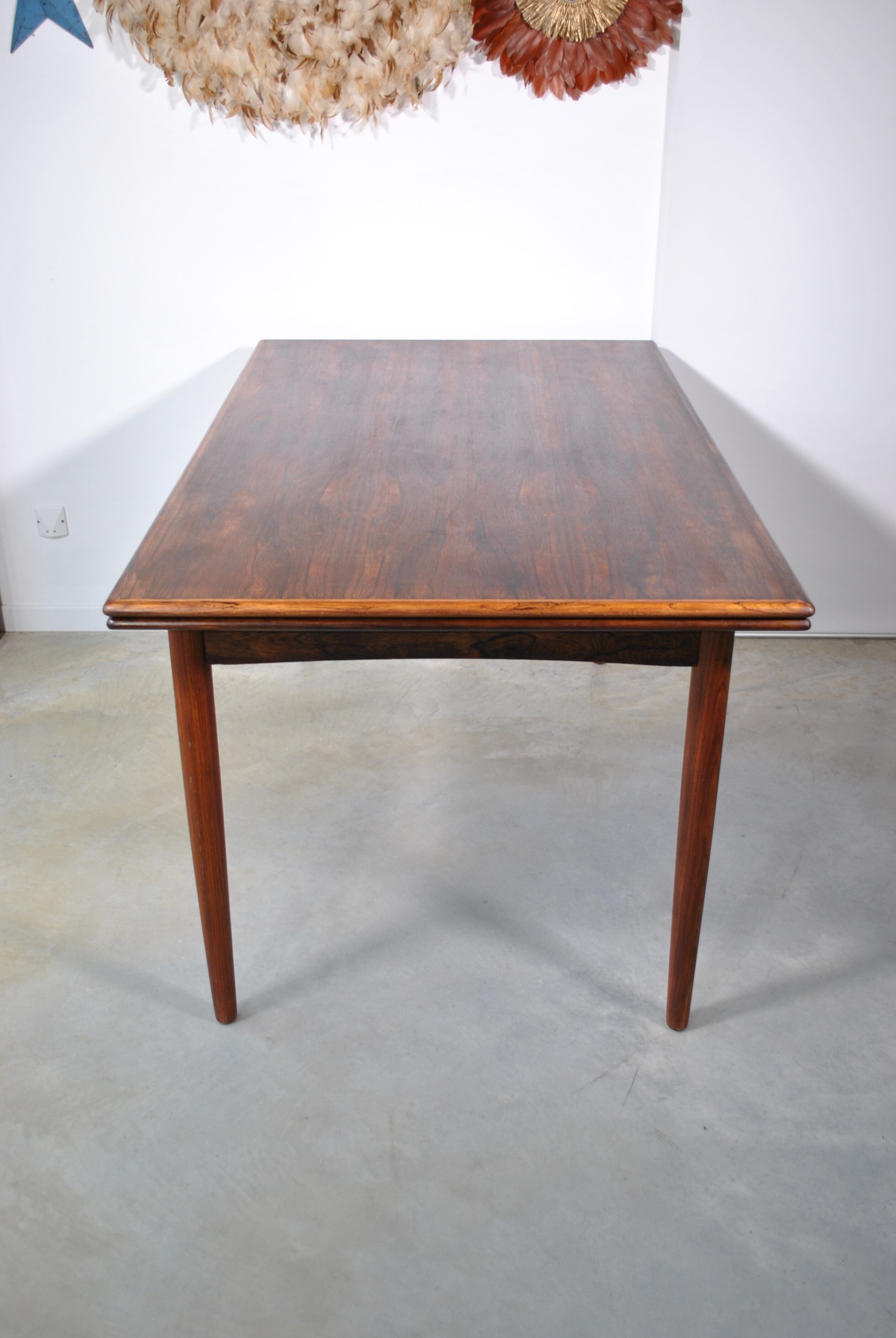 Extendable rosewood dining table year 60