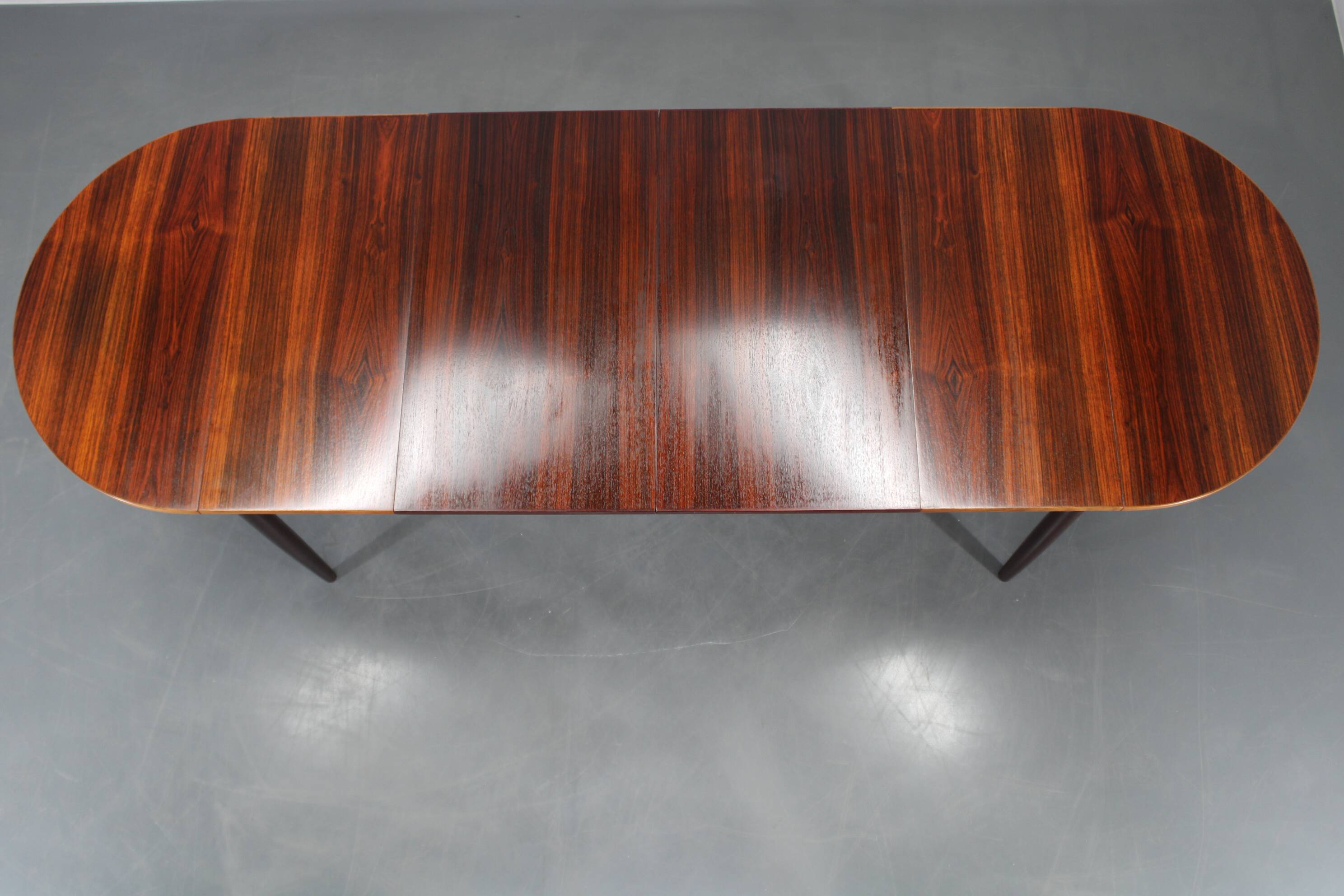 1960s Danish extendable palisander dining table, 4 leaves, restored