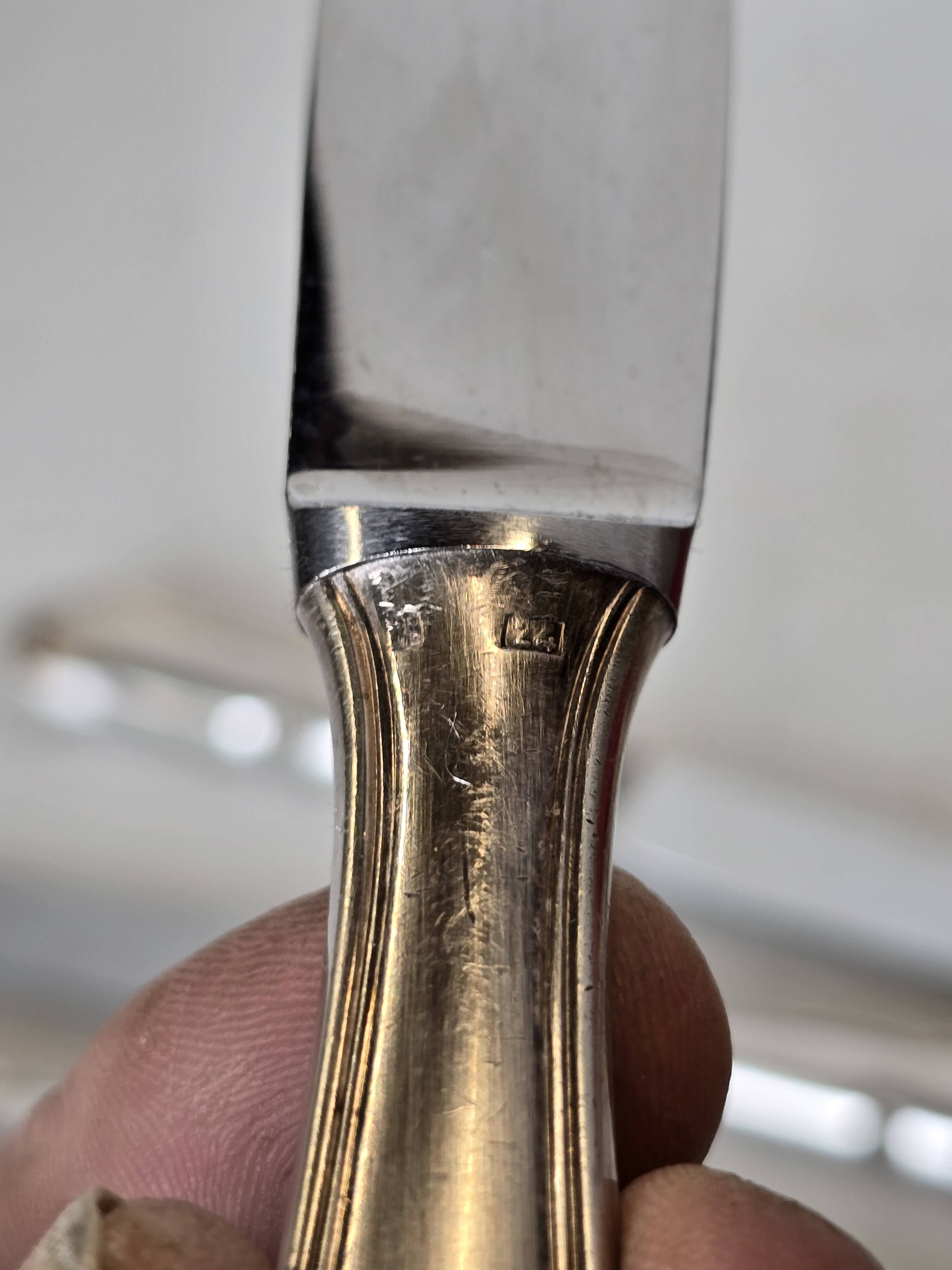 12 silver-plated knives mid-15th century