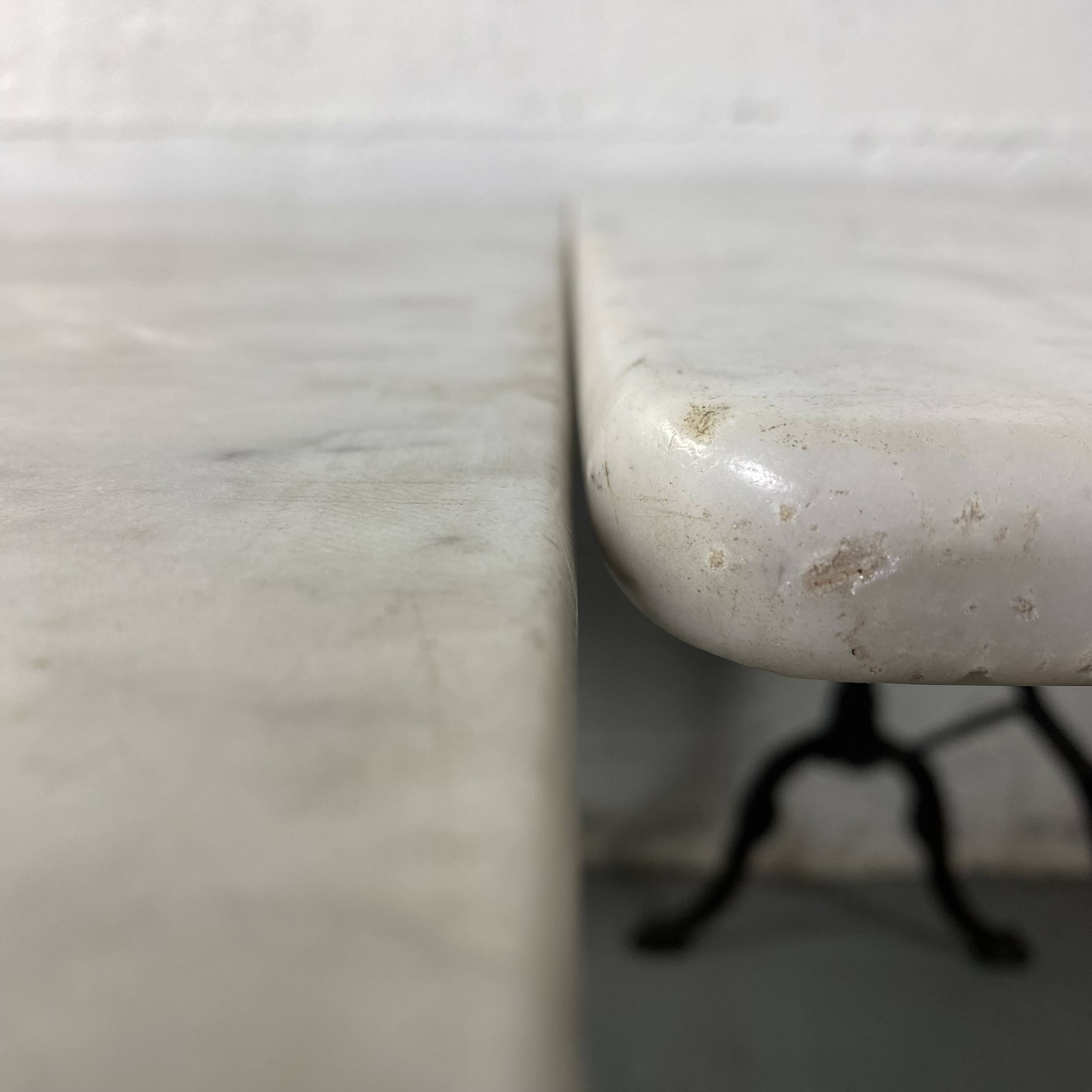 Set of two bistro tables in marble and wrought iron