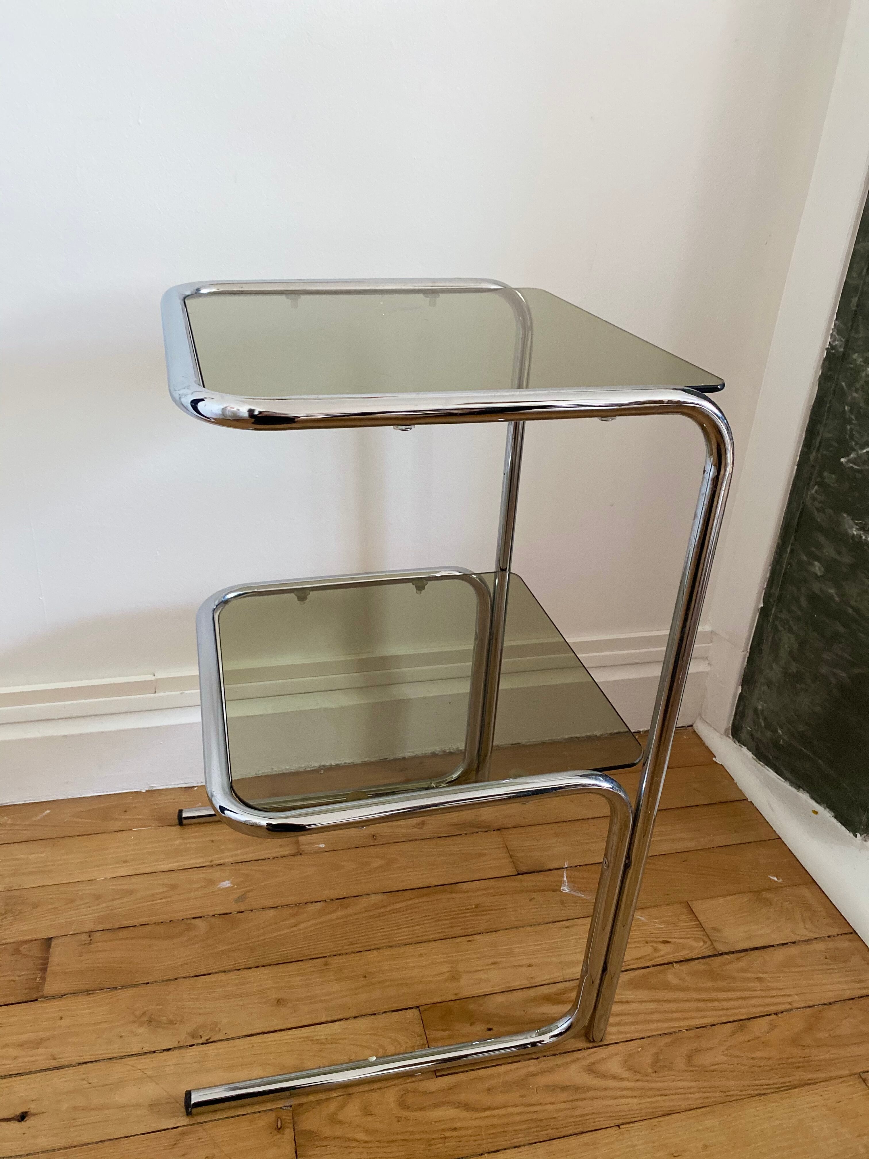 Chrome metal table and smoked glass