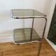 Chrome metal table and smoked glass
