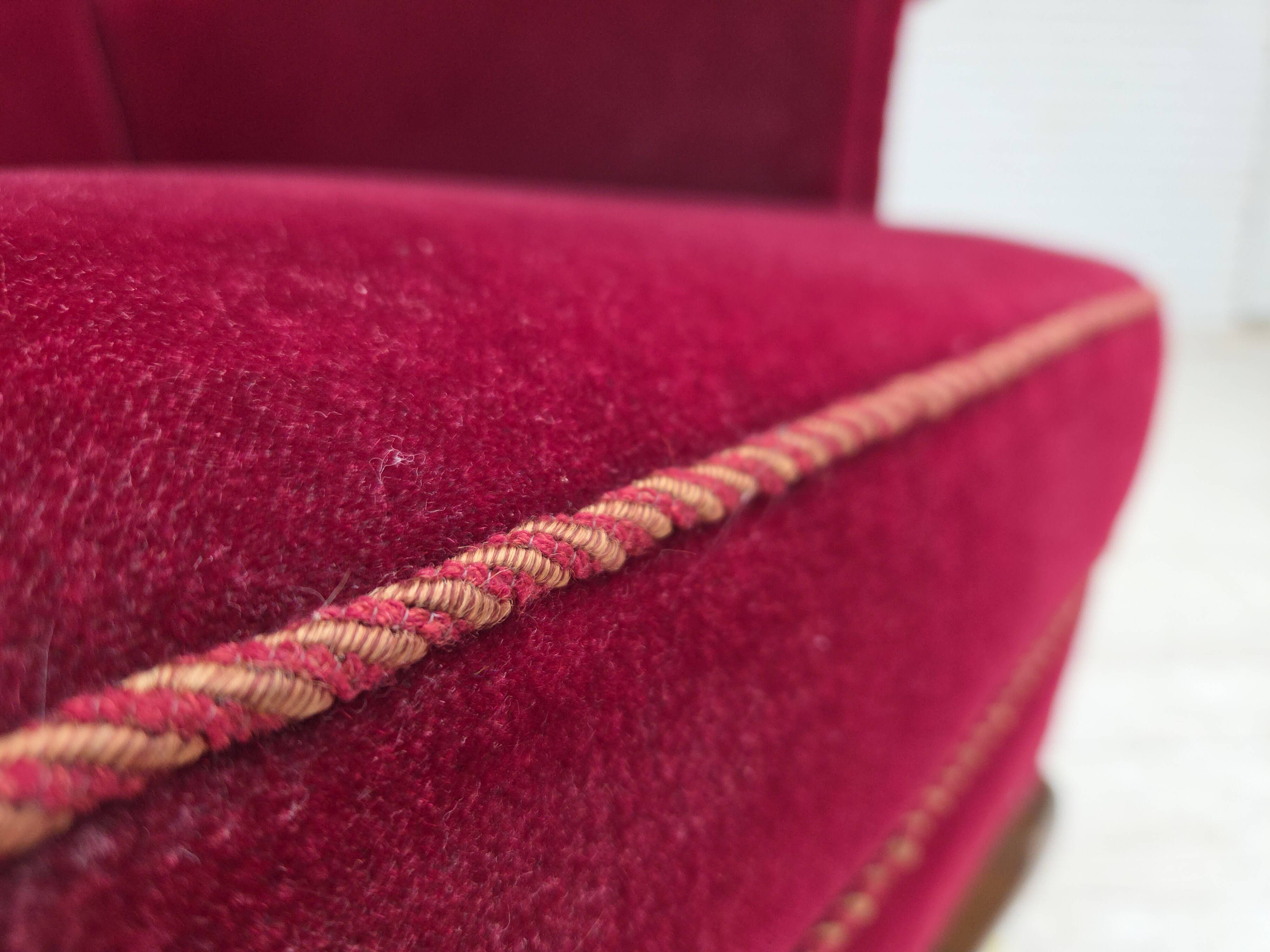 1960s, Danish highback wingback armchair, cherry-red furniture velour.