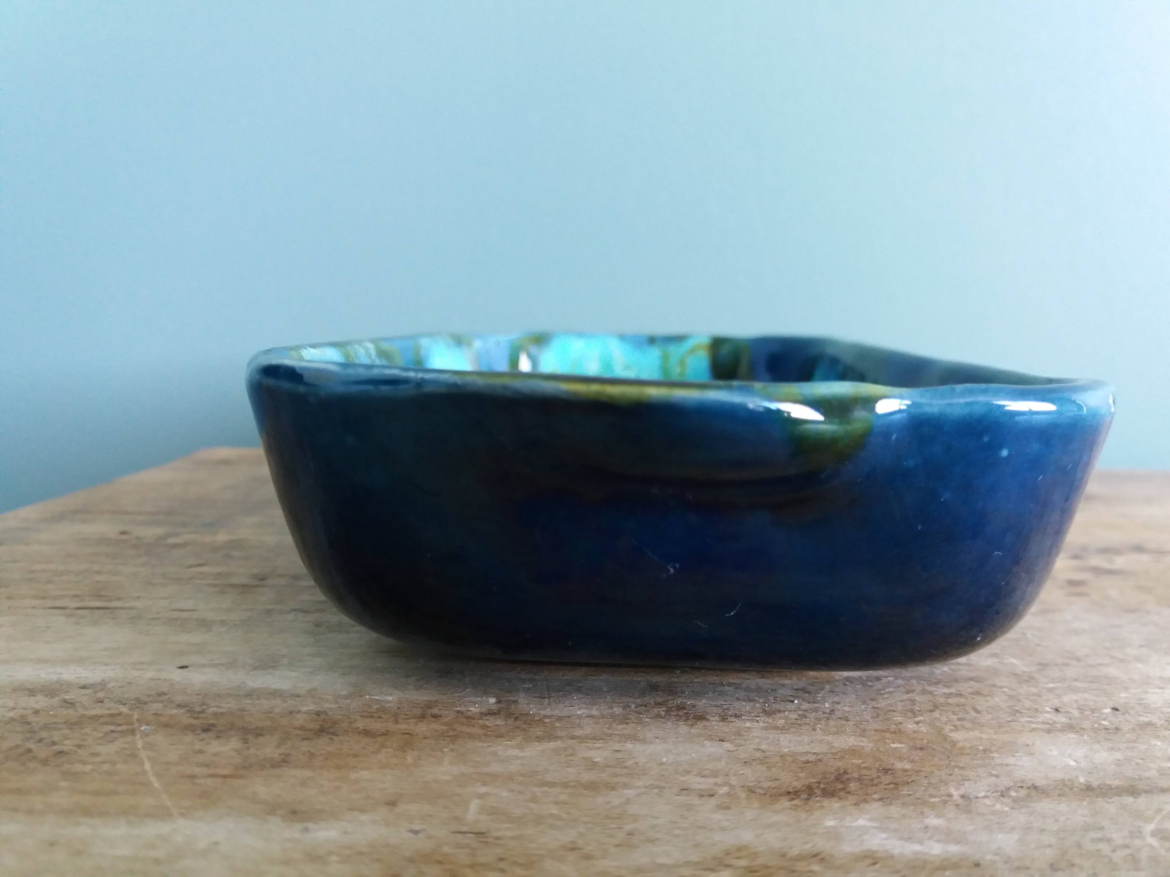 Vallauris stamped pocket emptier in flamed stoneware