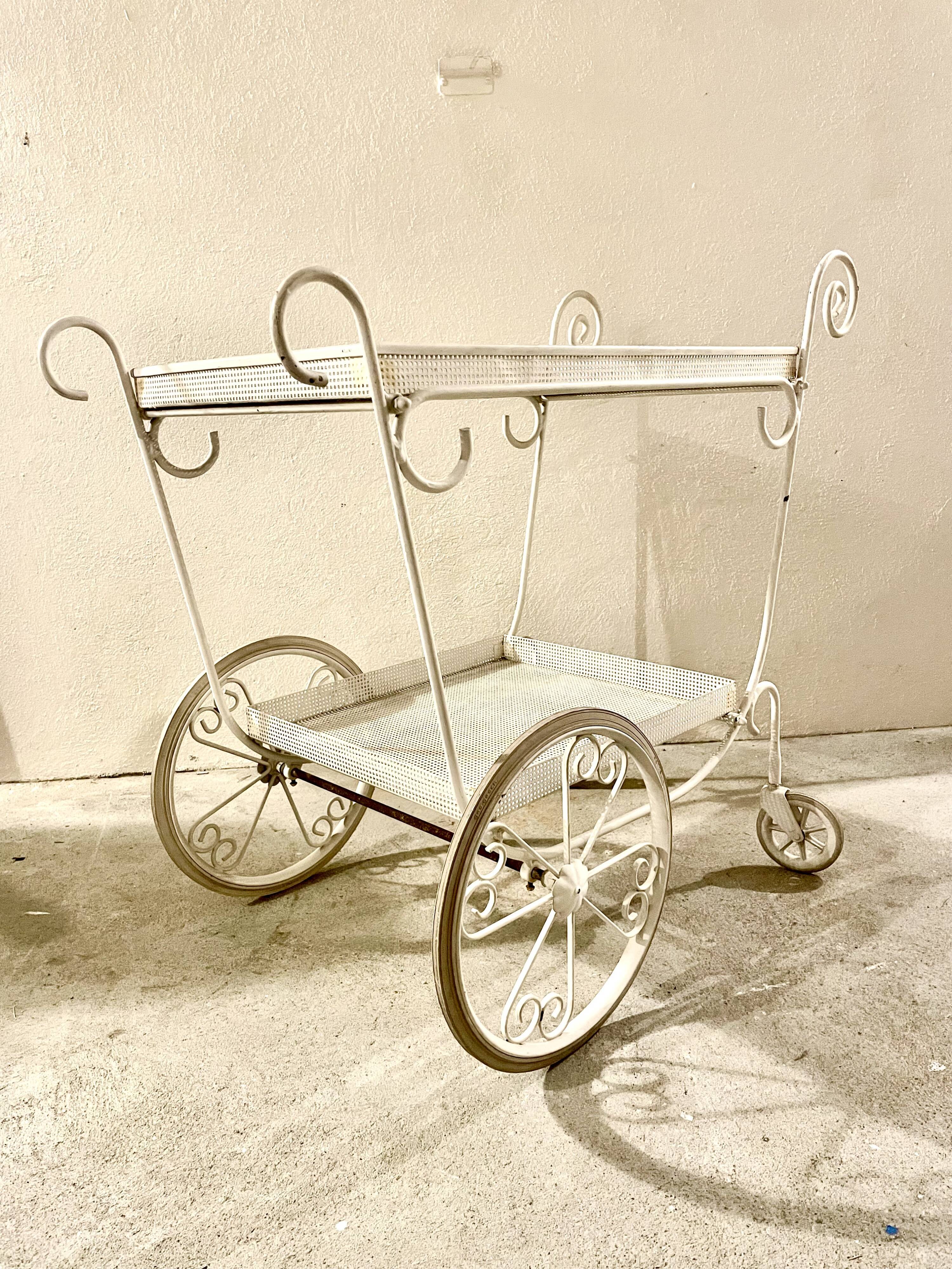 White perforated metal trolley