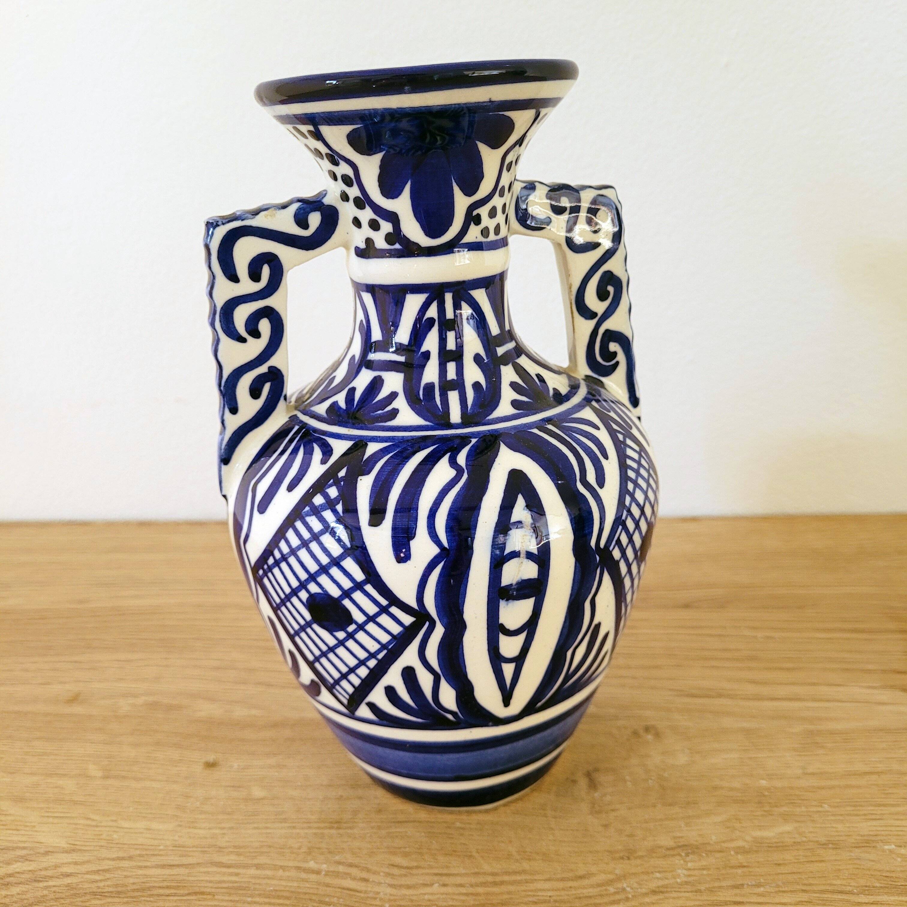 Vintage amphora vase with two handles blue