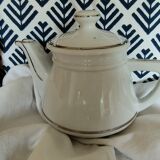 White and silver porcelain teapot