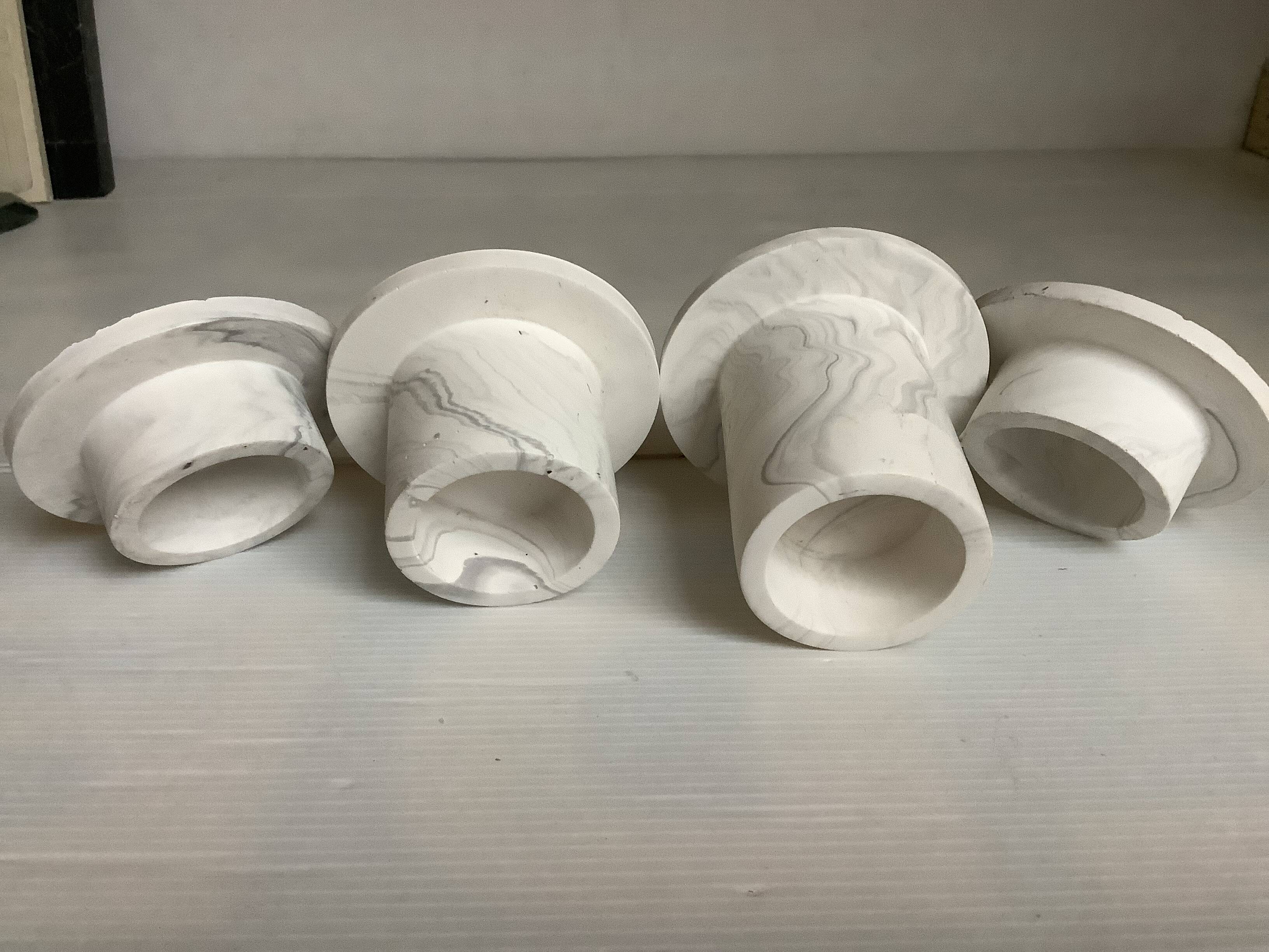 Four gypsum composite candle holders