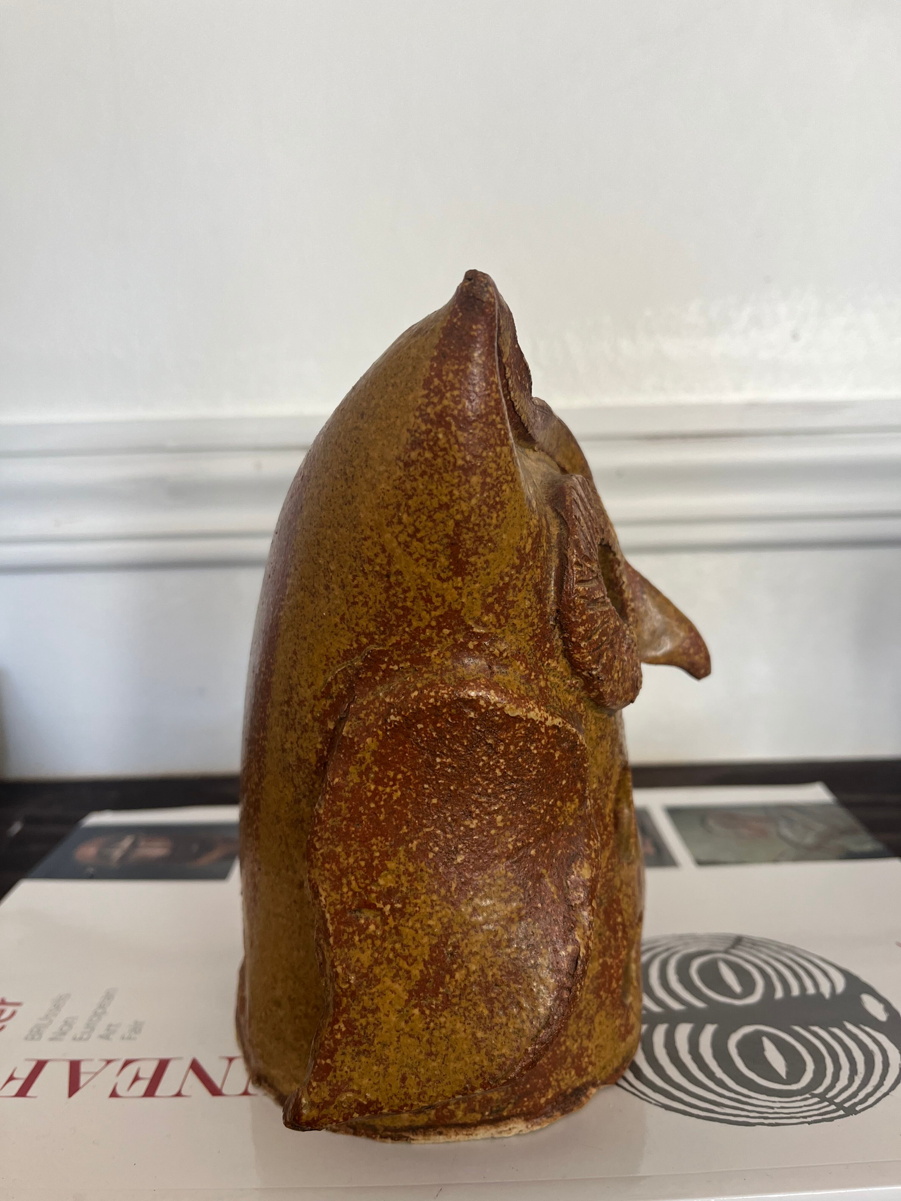 Stoneware lantern in the shape of an owl.