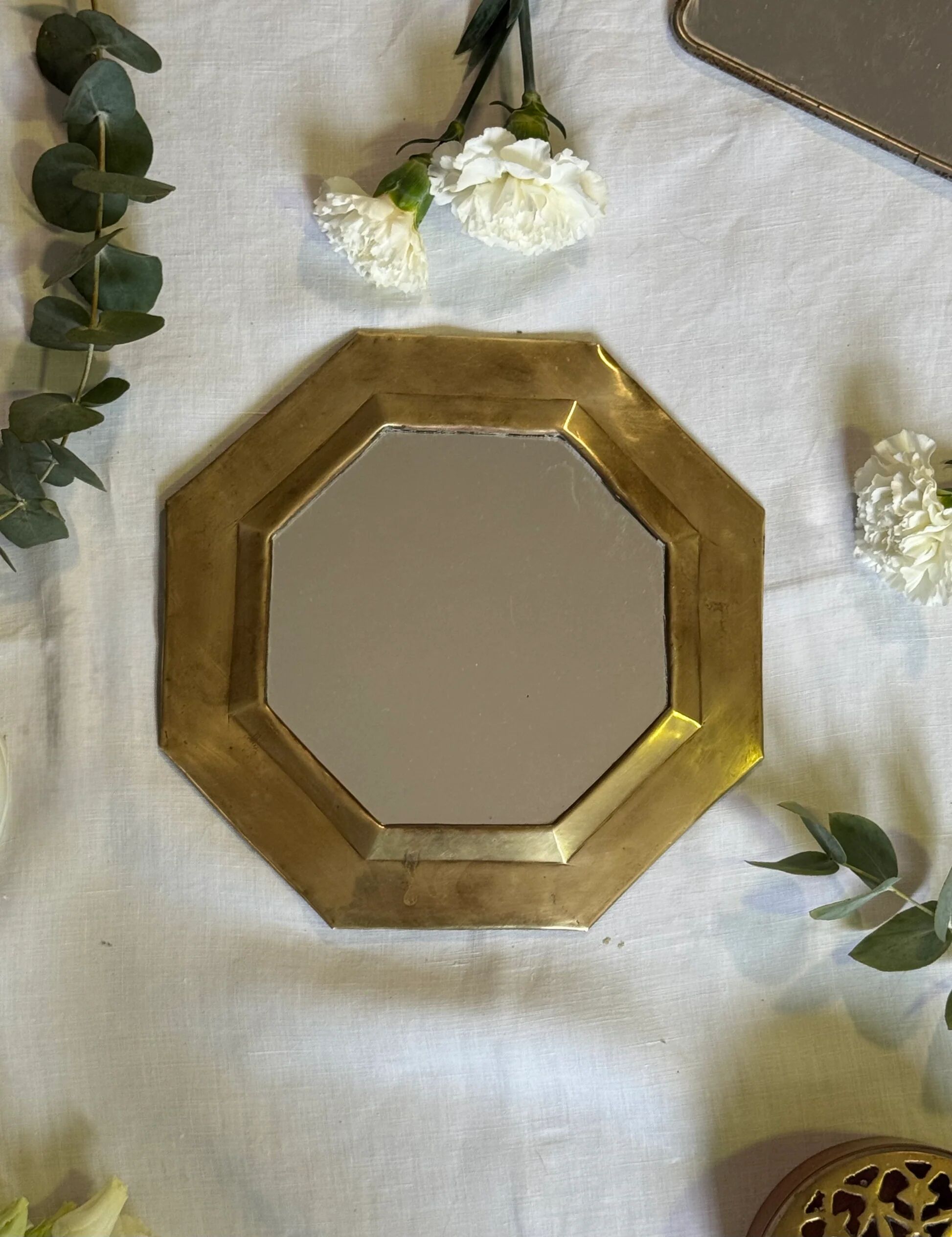 Oriental brass mirror