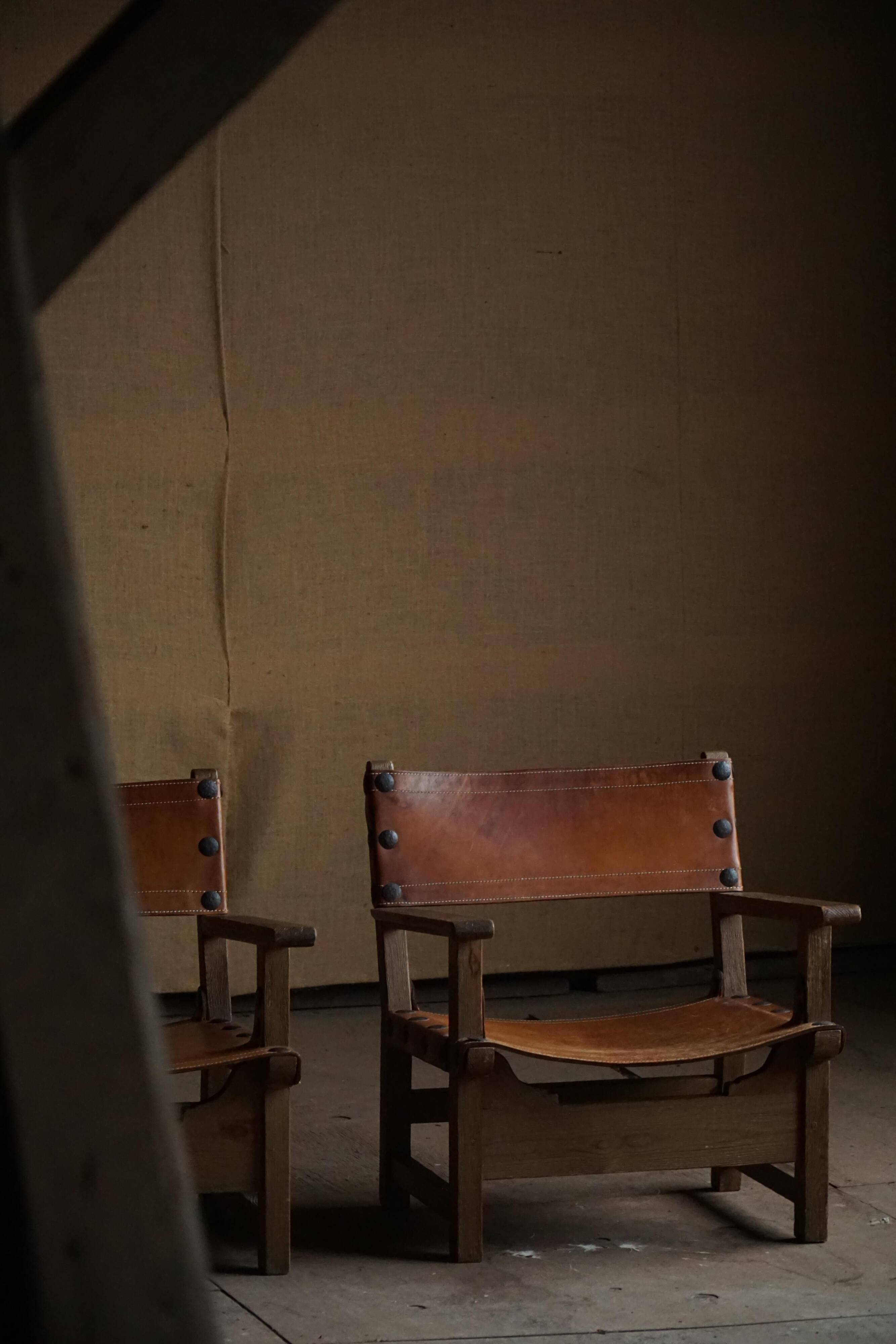 Pair of Spanish brutalist armchairs from the 1960s, wood and leather.
