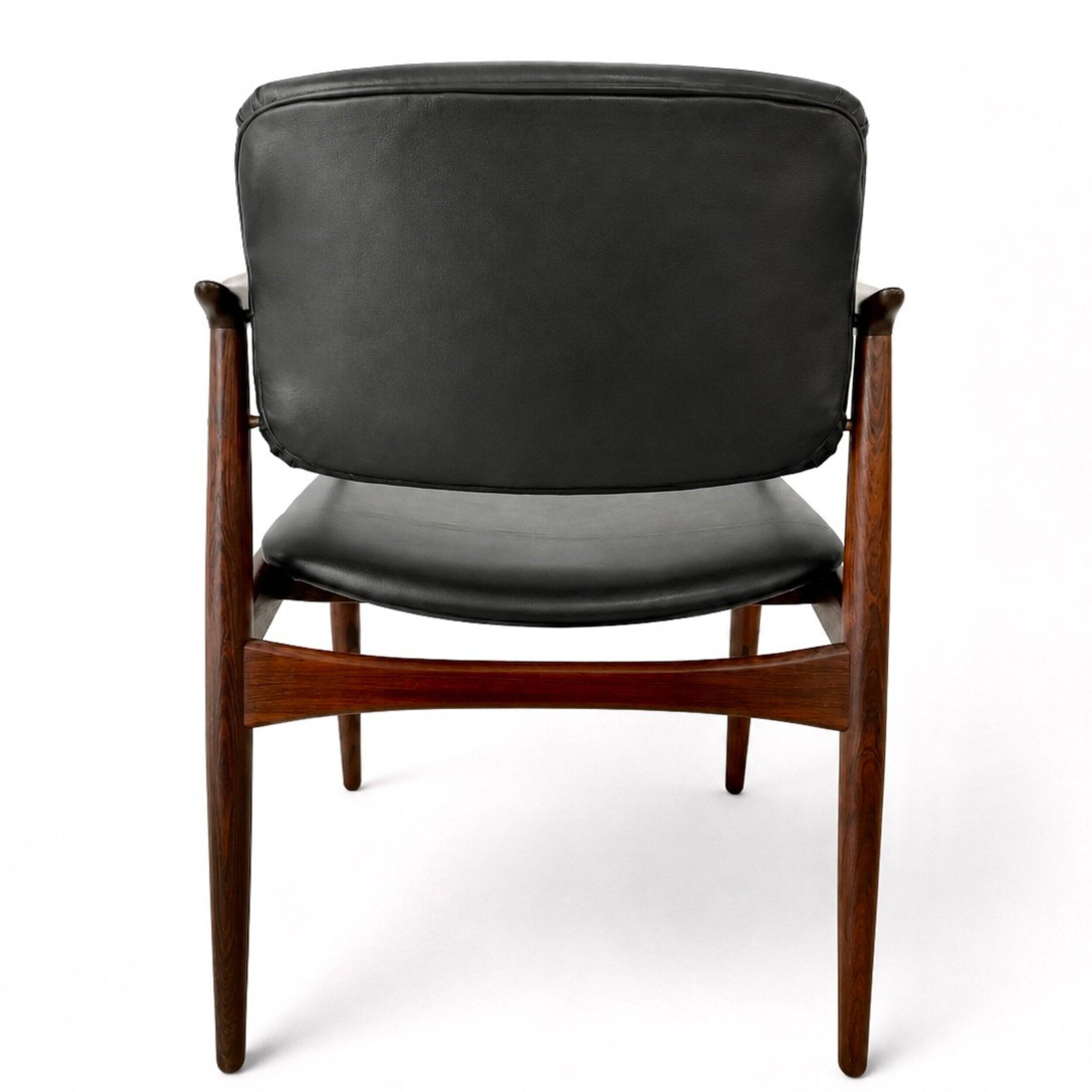 Captain armchair in rosewood by Erik Buch